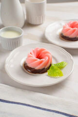 Strawberry and chocolate Pudding with sauce on white plate. Perfect for recipes, articles or any cooking content