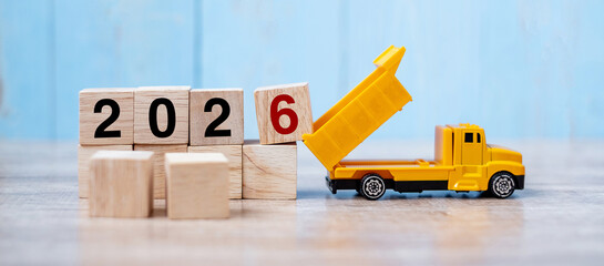 2026 Happy New year with miniature truck or construction vehicle. New Start, Vision, Resolution, goal, industrial, Warehouse concept