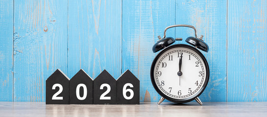 2026 Happy New Year with retro alarm clock and wooden number. New Start, Resolution, Goals, Plan,...