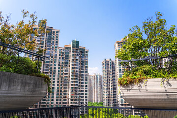 Shanghai. Modern architecture showcases greenery in Shanghai's urban landscape during daytime
