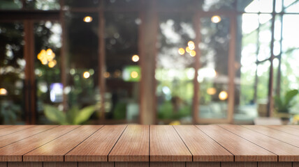 	
Empty wooden table top with lights bokeh on blur restaurant background.