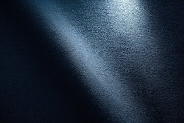 Dark textured surface with dramatic light streaks