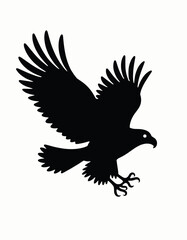 Black eagle silhouette diving with talons extended
