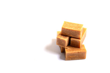 caramel candy close up on white background,