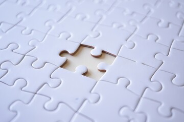 White puzzle pieces background with missing piece concept for problem solving game idea