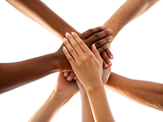 Diverse group of hands stacked together against a bright white background showing unity and teamwork