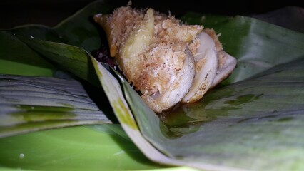 Low angle shot of traditional snacks in Indonesia. a popular snack with brown sugar sauce and grated coconut.