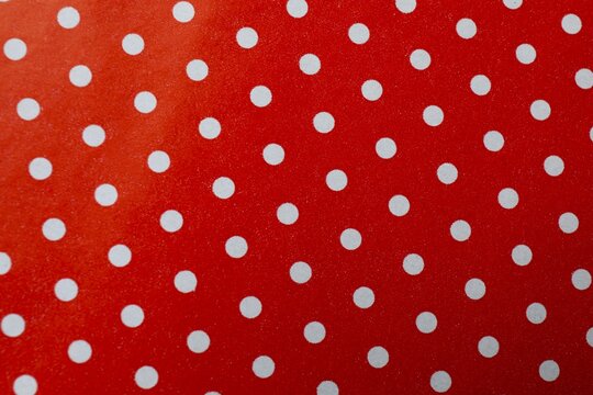 Top view of white and red Polka dot background
