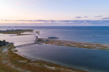 Aerial view of a coastal area near Copenhagen, Denmark, showing water, sandbanks, marshlands, a...