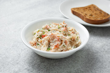 A view of a bowl of king crab salad.