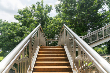 stairs with handrails on both sides in a park