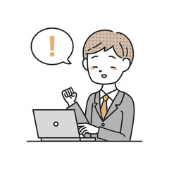 パソコンの前で喜ぶスーツを着た男性