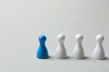 Pawns on light gray background. Concept of Diversity, Inclusion and Equality, space for text