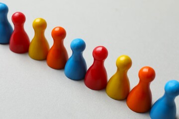 a row of colored chips on gray background