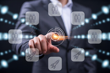 Person touching digital interface with people and rocket icons