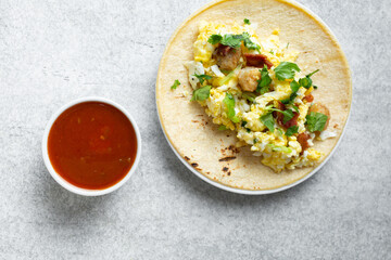 A top down view of a breakfast taco.