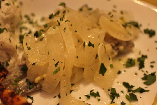 Italian cuisine: sarde in saor (fried sardines and sweet and sour onions) in Venice, Italy
