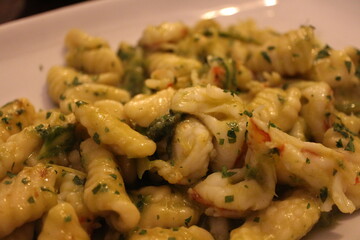 Sicilian cuisine: casarecce with prawns and asparagus in Venice, Italy