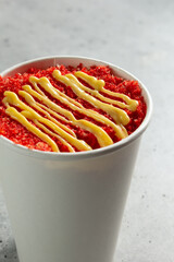 A view of a cup of esquites.