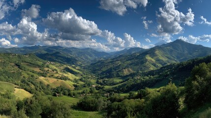 Fototapeta premium Panoramic mountain valley, lush green hills, bright sky