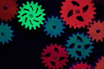 Colorful gears on a dark background