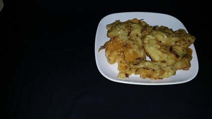 Bakwan vegetable or fried vegetables is one of the typical Indonesian foods. Close up shot of...