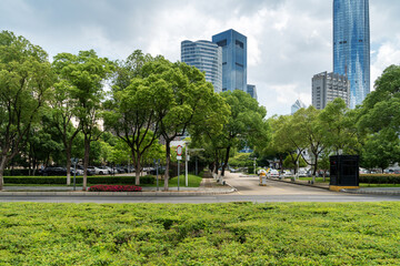 city park with modern building background in shanghai
