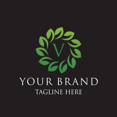 Obraz premium Initial letter V green leaves organic natural logo design, cosmetics and beauty vector icon concept