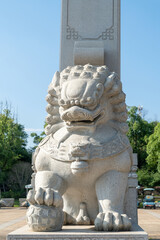 Fototapeta premium Stone Lion sculpture, symbol of protection & power