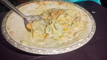 A Plate of crispy yougrt mix salad,mix yougrt and lentil fritters,