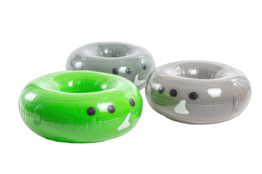 Three inflatable donut-shaped pool toys, one green, two gray, with simple faces