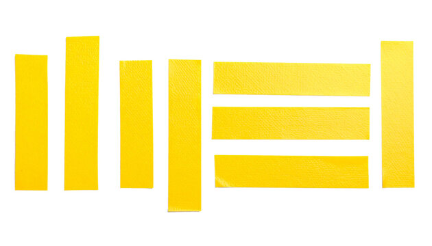 Isolated on white, vibrant yellow plastic adhesive tape stripes, cleanly cut and perfectly arranged, ideal for repairs, crafting, labeling, packaging, and creative projects, offering durability, flexi