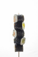 Sushi maki close up on a white background isolated