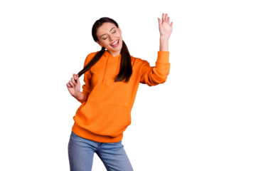 Portrait of positive cheerful funky teenager dance enjoy on party club wear sportswear denim jeans isolated over violet purple color background