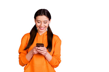 Portrait of positive cheerful youngster use her cellphone follow blogs bloggers wear sporty wear...