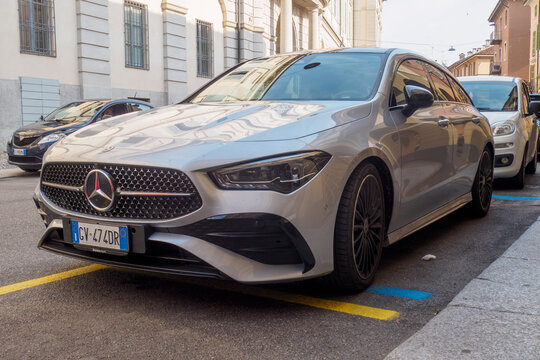 Modern Mercedes CLA Shooting Brake parked on a city street, showcasing its sleek design and luxury features