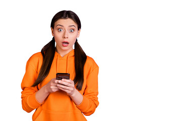 Like from favorite blogger? Omg! Portrait of astonished youth teenager girl use her cellphone get...
