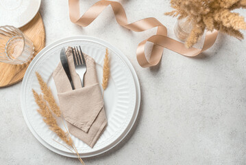 Boho table setting with dry plants