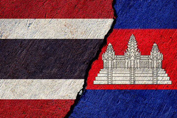 thailand and cambodia flags painted on cracked concrete wall