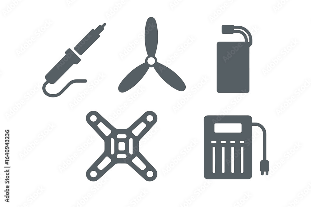 Aufkleber tools and components for drone assembly on a workbench captured in a bright workshop setting