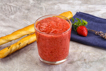 Sweet strawberry smoothie with milk