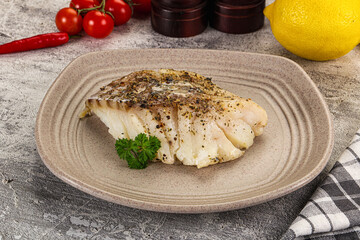 Baked cod fish fillet with spices