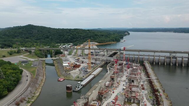 Stunning 4K drone footage of Chickamauga Dam, showcasing its structure, the Tennessee River, and scenic beauty. Perfect for infrastructure, travel, or history projects.