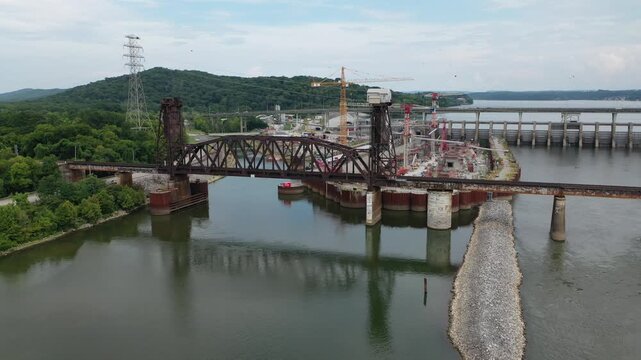Stunning 4K drone footage of Chickamauga Dam, showcasing its structure, the Tennessee River, and scenic beauty. Perfect for infrastructure, travel, or history projects.