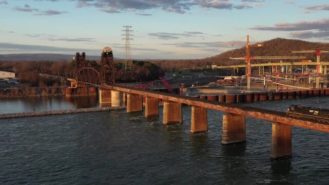 Stunning 4K drone footage of Chickamauga Dam, showcasing its structure, the Tennessee River, and scenic beauty. Perfect for infrastructure, travel, or history projects.