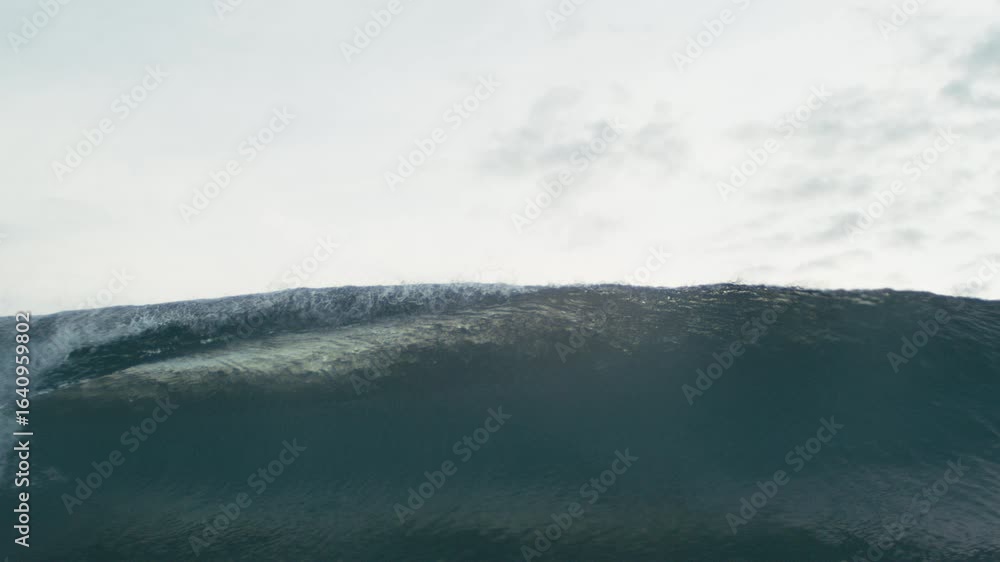 Poster turquoise wave curls and crashes in mesmerizing slow motion with rich surface texture