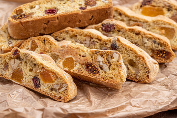 Italian Almond Biscotti biscuits in a rustic home made pottery bowl. Studded with almonds and...