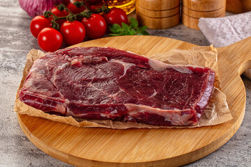 Gourmet raw rib eye steak