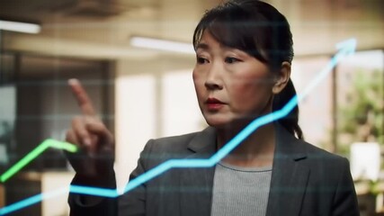 Businesswoman analyzing growth trends on a digital screen in a modern office setting - Powered by Adobe