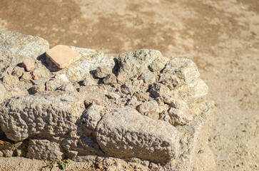 A close up of an archaeological find a piece of pottery on ancient stone ruins discovery concept